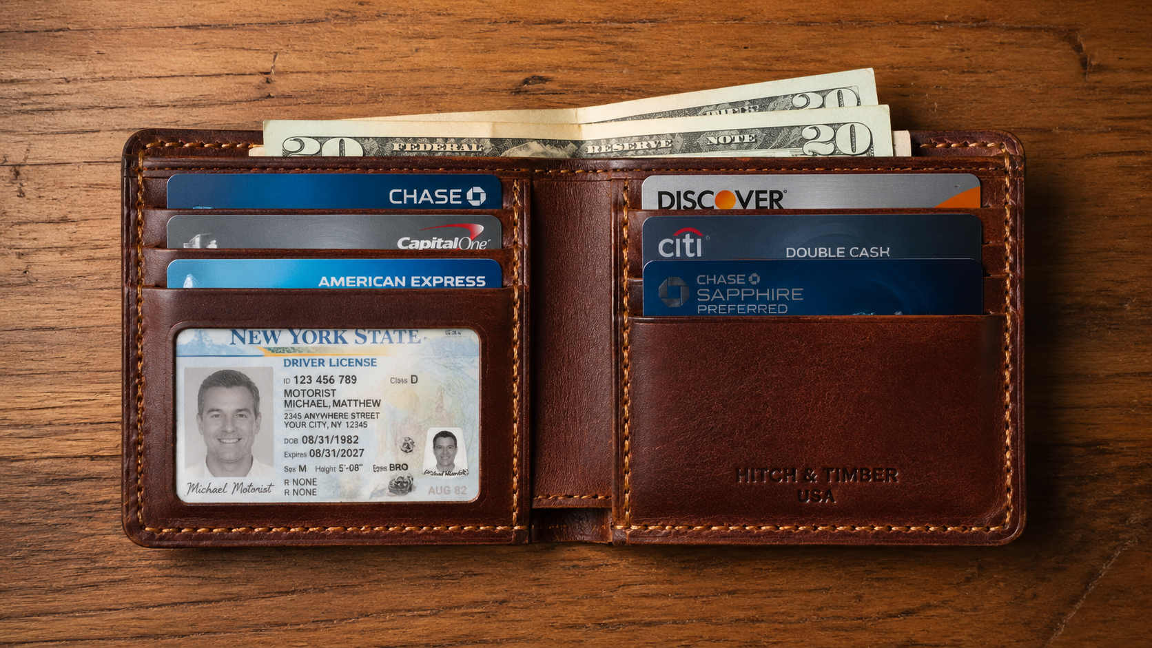 Traditional full-grain leather bifold wallet open showing card slots and cash compartment